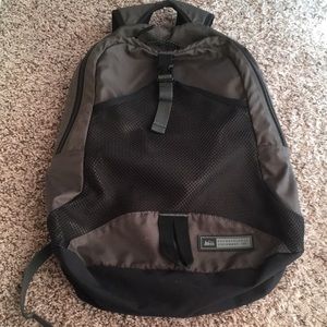 REI lightweight gray and black backpack.